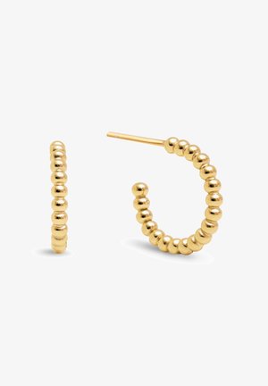 Boucles d'oreilles créoles en or composées de petites perles rondes avec un fermoir à tige, présentées sur un fond blanc.