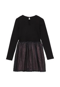 Abito lungo nero a maniche lunghe con top a coste e gonna trasparente a pois, dotato di una piccola apertura a chiave con bottone sul retro.