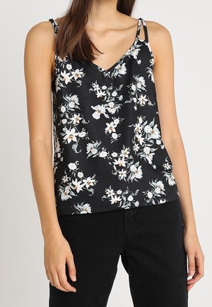 Floral bedrucktes Camisole aus schwarzem Stoff mit dünnen Trägern. Es zeigt weiße und pastellfarbene Blumenmuster vor einem dunklen Hintergrund.