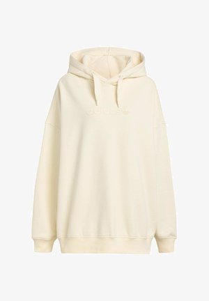 Vettivärinen ylisuurikokoinen huppari, joka on valmistettu pehmeästä kankaasta. Hupparissa on nyöritettävä huppu ja kohokuvioitu Adidas-logo edessä.