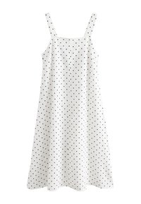 White sleeveless dress with black polka dots, featuring a loose fit, square neckline, and straight hemline. Made from lightweight fabric.