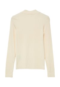 Rękaw długi, prążkowany top w jasnobeżowym kolorze, z wysokim kołnierzem, dopasowanym krojem i gładką teksturą. Brak widocznych wzorów i elementów ozdobnych.