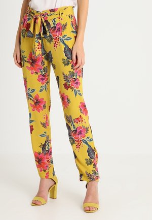 Hose mit Blumenmuster in Senfgelb mit rosa und grünen Akzenten. Verfügt über einen gebundenen Bund und einen geraden Schnitt.