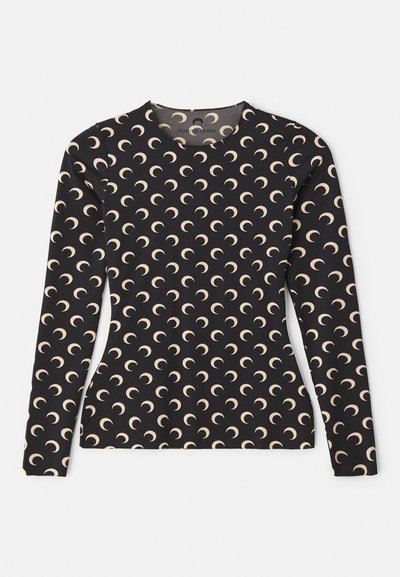 Ilga rankovė juoda golfo maikutė su pakartotiniu smailių mėnulio raštu smėlio spalva. Yra apvalus iškirpimas ir švelni, elastinga medžiaga.