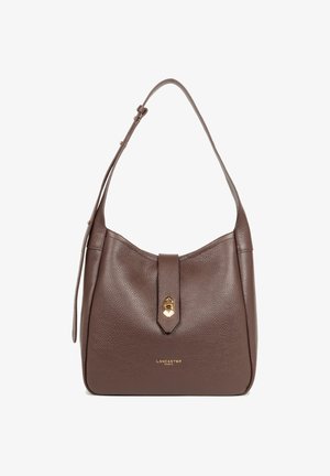 Brown leather shoulder bag with a smooth texture, rounded shape, gold hardware accent, and a front closure strap featuring a gold button.