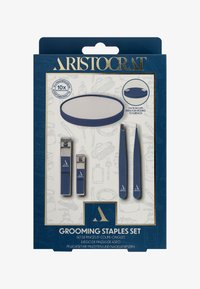 Set básico de cuidado personal con diseño azul marino, incluye dos pinzas, cortaúñas y un espejo con lupa y ventosas.