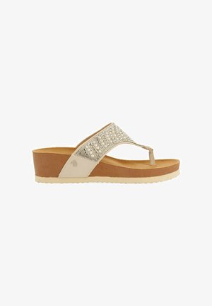 Sandalias de cuña beige con una tira de cuentas, plantilla texturizada y suela de goma marrón claro, con un sutil logo en el lateral.
