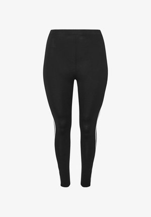 Leggings noirs en tissu extensible, dotés de deux bandes latérales blanches et d'une taille haute pour une silhouette ajustée.