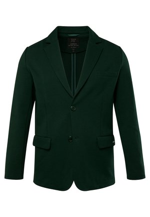 Donkergroene blazer van gladde stof. Opvallende kenmerken zijn de sluiting met twee knopen, genoteerde revers en twee voorkanten zakken.