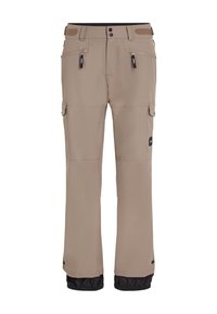 Beige outdoor pants with black elastic cuffs, featuring multiple zippered pockets and snap closures. Made from durable, textured fabric.