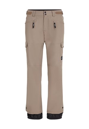 Beige outdoor pants with black elastic cuffs, featuring multiple zippered pockets and snap closures. Made from durable, textured fabric.