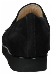 Black suede shoe with a smooth finish, rounded heel, and a sturdy black sole. Features a low profile and minimalist design.