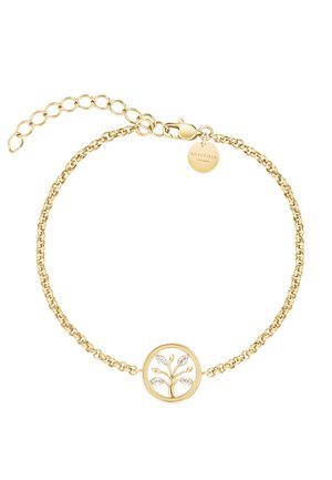 Delikatna złota bransoletka łańcuszkowa z okrągłym zawieszkiem z motywem drzewa ozdobionym małymi przezroczystymi kamieniami i regulowanym zapięciem.