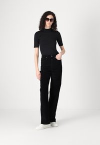 ONLY Tall ONLHOPE GLOBAL HIGH WAIST WIDE  - Trousers - black