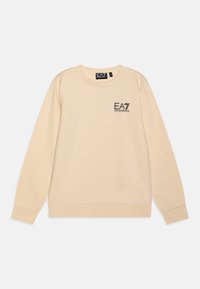 Beige sweatshirt med långa ärmar, rund halsringning och ribbade muddar. Har en liten svart logotyp på bröstet. Mjukt textilmaterial.