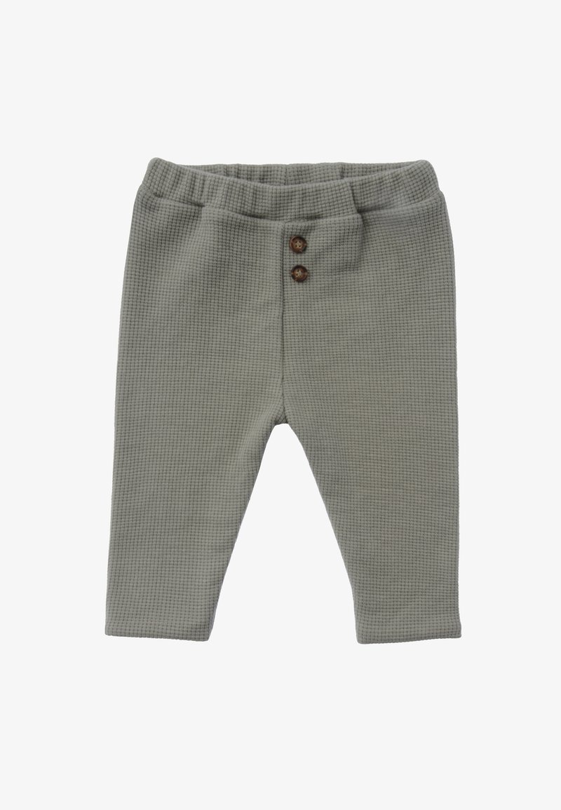 Grüne, waffelstrukturierte Hose mit einem elastischen Bund und zwei braunen Knöpfen an der Vorderseite. Mit konischem Bein design.