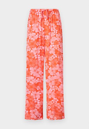 Pantalones anchos de color naranja con estampado grande de flores en tonos rosa y rojo, cintura elástica con cordón ajustable.