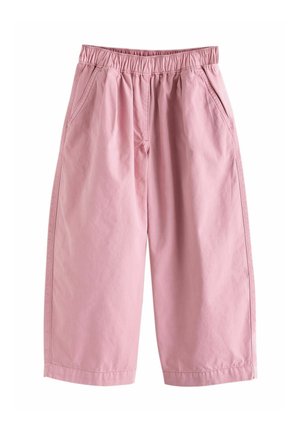 Loose-fitting, light pink cropped pants with elastic waistband and side pockets, made from soft fabric, displayed against a white background.