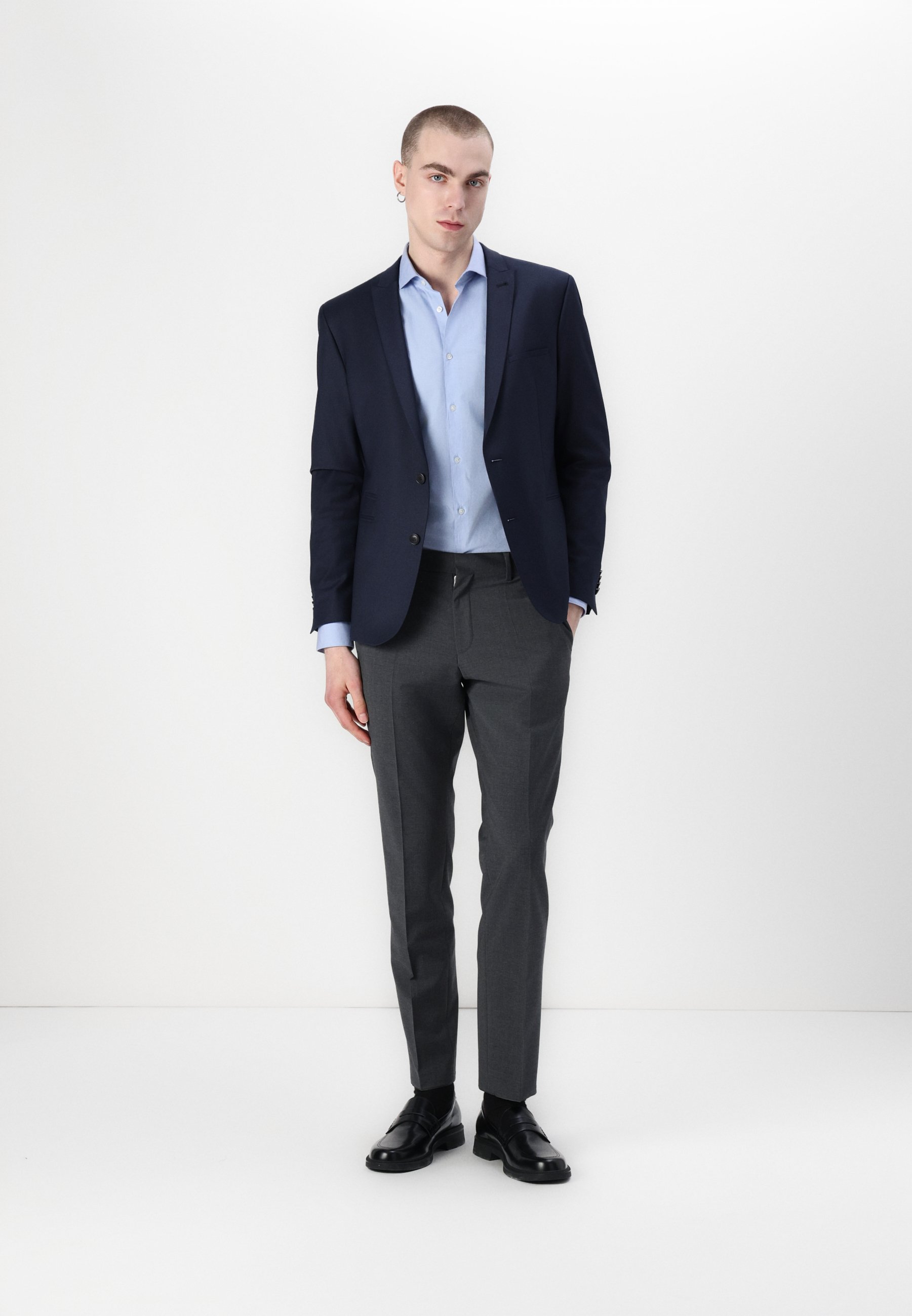 blue coat pant with black shoes