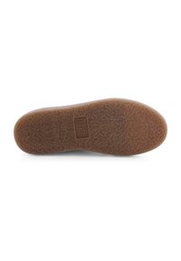 Brown rubber shoe sole features a textured surface with a circular pattern, marked with a logo in the center. Flat, slightly rounded shape.