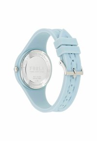 Reloj con correa de silicona azul claro y fondo de caja redonda de acero inoxidable plateado, que presenta un diseño sencillo y cierre de hebilla.