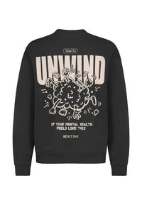 Zwarte sweatshirt met grote beige tekst "Tijd om tot rust te komen" en een grafiek van een chaotische explosie van armen en benen, plus de tekst "Als je mentale gezondheid zo aanvoelt."
