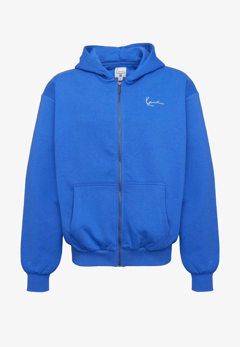 Hanorac albastru cu fermoar, buzunare frontale, manșete și tiv cu rețea, glugă și mic logo alb semnătură pe partea stângă a pieptului.