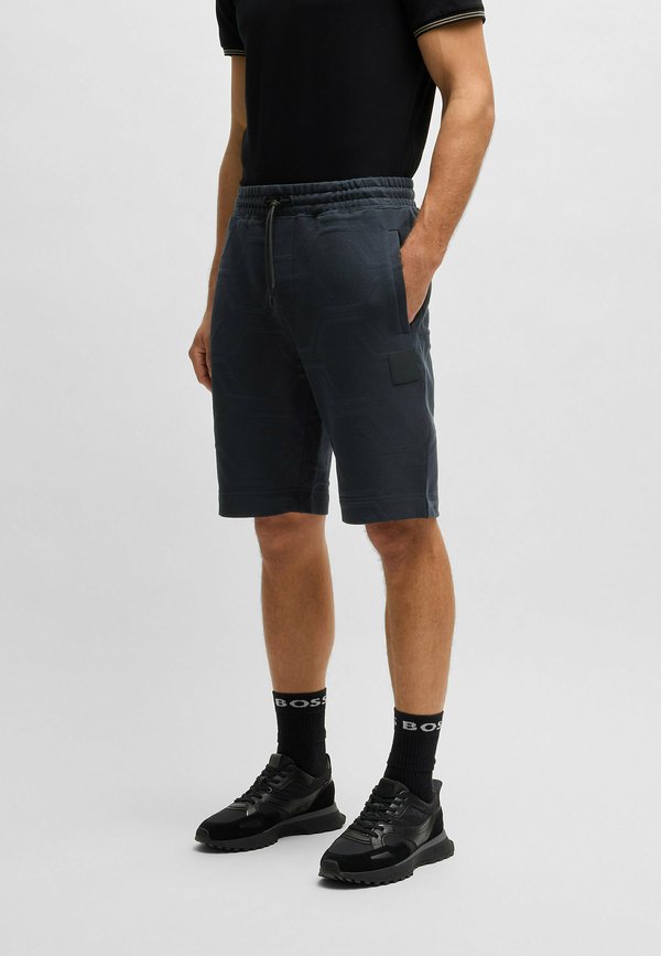 HUXLEY HEXAQUILT - Tracksuit bottoms