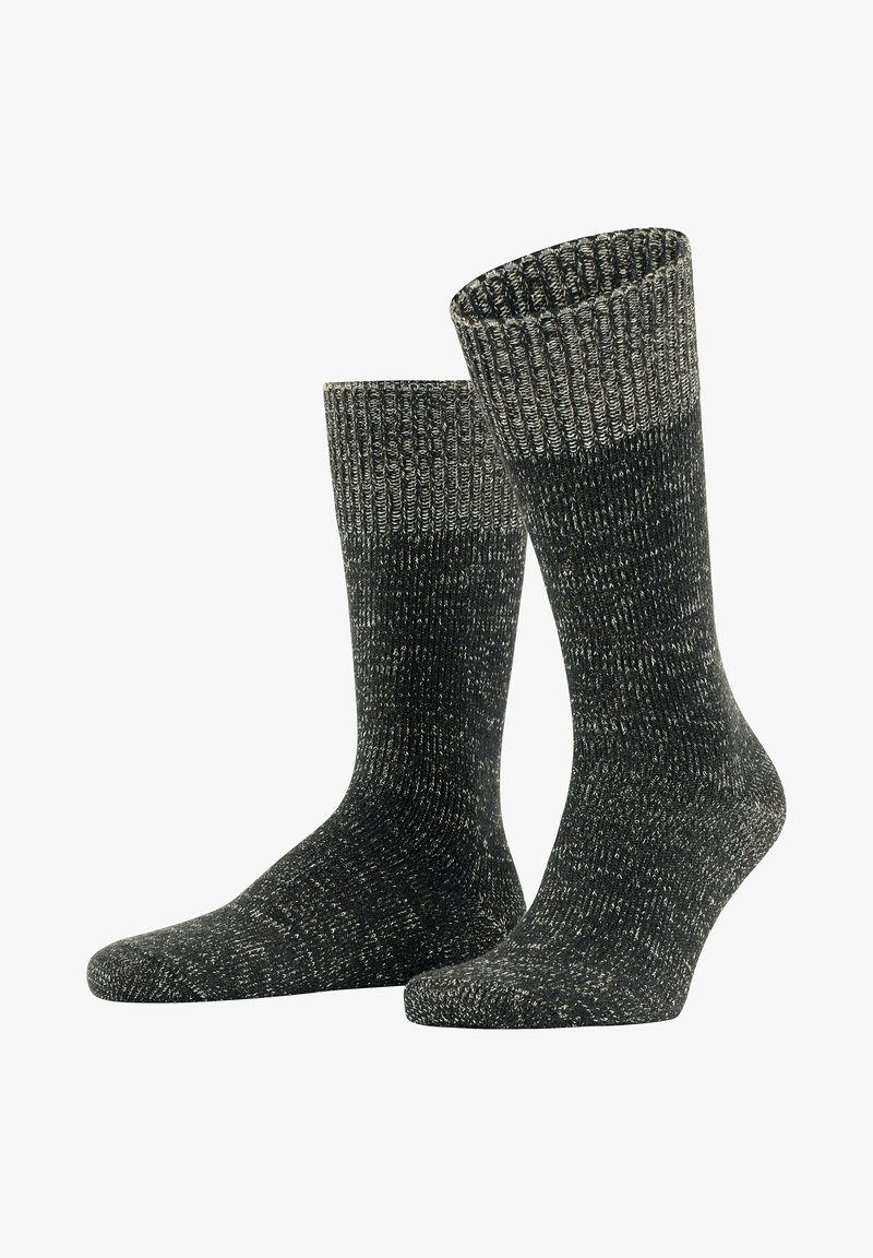 Gestrickte Socken in Dunkelgrau mit einem helleren gerippten Bündchen. Strukturierter Stoff mit einem gesprenkelten Muster. Crew-Länge Design.