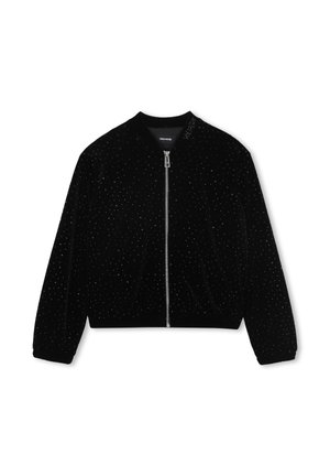 Black velvet zip-up jacket with small shiny studs, ribbed cuffs and hem, and "VOLTAIRE" embroidered on the collar.