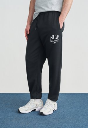 REIMAGINED JOGGER - Tracksuit bottoms - black