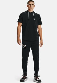 Under Armour RIVAL TERRY - Teplákové kalhoty - black