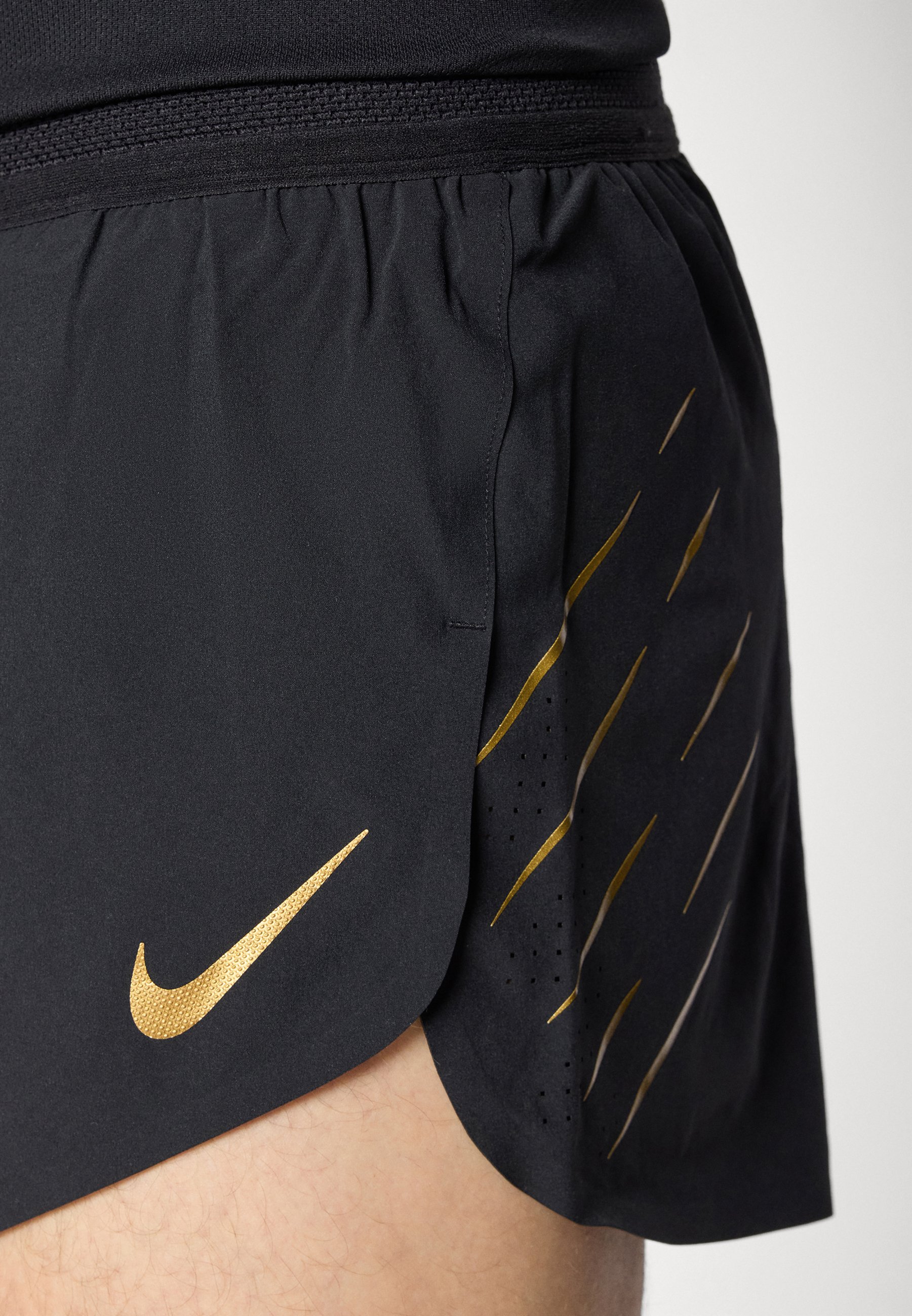 black gold nike shorts
