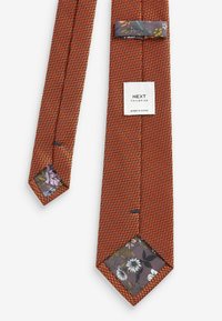 Next TEXTURED - Solmio - orange
