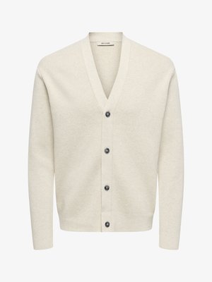 Light beige cardigan made of soft fabric, featuring a V-neck, long sleeves, and six dark buttons down the front. Smooth texture.