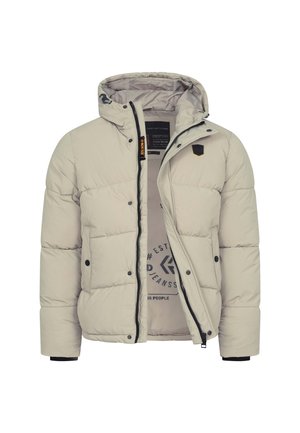 Chaqueta de plumas de color beige claro con capucha desmontable, cierre de cremallera y detalles en negro. Presenta un diseño acolchado y un estampado de logo en el interior.