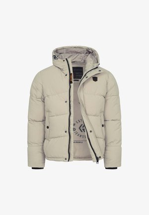 Chaqueta de plumas de color beige claro con capucha desmontable, cierre de cremallera y detalles en negro. Presenta un diseño acolchado y un estampado de logo en el interior.