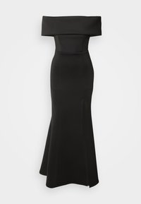 Robe noire à épaules dénudées avec un corsage ajusté, un ourlet évasé et une fente sur le côté. Fabriquée en tissu lisse sans motifs ni accessoires visibles.