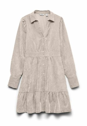 Svetlo bež obleka iz korduroga z dolgimi rokavi, ovratnikom, z zadrgo spredaj, pasom, ki se oprime telesa, in volančkastim robom.
