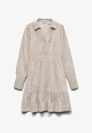 Svetlo bež obleka iz korduroga z dolgimi rokavi, ovratnikom, z zadrgo spredaj, pasom, ki se oprime telesa, in volančkastim robom.