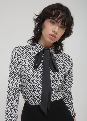 Calliope FANTAISIE  - Button-down blouse - une variante