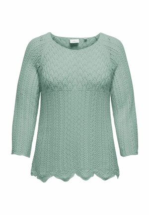 Maglione girocollo verde chiaro lavorato a maglia con un motivo testurizzato, maniche a tre quarti e orlo ondulato. Realizzato in tessuto traspirante.