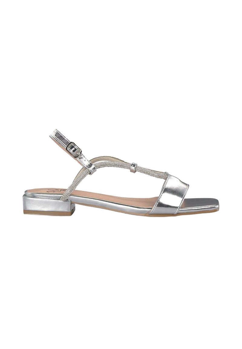 Zilveren platte sandalen met een metallic afwerking, voorzien van een T-band ontwerp, een verstelbare enkelgesp en een vierkante neusvorm. Gladde textuur.
