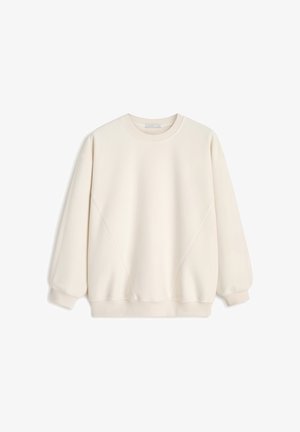 Kremowy sweatshirt z okrągłym dekoltem, opadającymi ramionami i ściągaczami. Miękka tkanina z minimalnymi szwami i bez wzorów.