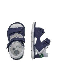 Sandali blu navy con cinturini in Velcro regolabili. Realizzati in materiale sintetico, presentano una suola grigia con dettagli verdi e un design arrotondato.