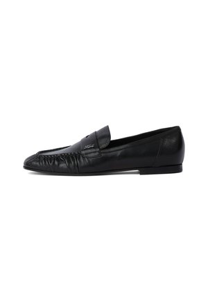 Black leather loafers with a rounded toe, stitched detailing on the front, and a flat sole. Minimalist design with a subtle logo accent.