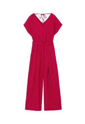 Salopetă fucsia cu mâneci scurte, decolteu în V, legată la spate și picioare largi. Stoff texturat cu centură auto-legătoare la talie.