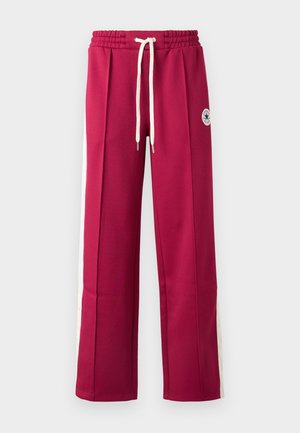 Pantalones deportivos granate con cintura elástica, cordón crema y franjas laterales blancas contrastantes con detalles de botones. Logotipo bordado.