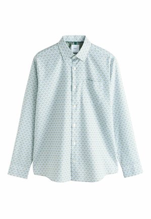 Långärmad skjorta i ljusblått med ett upprepat grönt lövmönster, knappar framtill och en bröstficka. Tillverkad i bomull.
