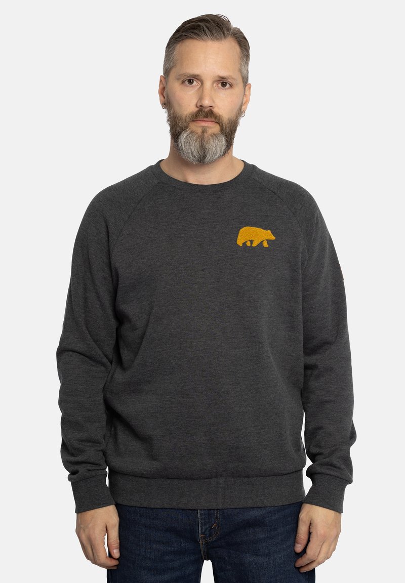 Grijze sweatshirt met een geribbelde halslijn en manchetten, voorzien van een kleine gele beer grafiek op de borst. Zachte textuur, ontspannen pasvorm.